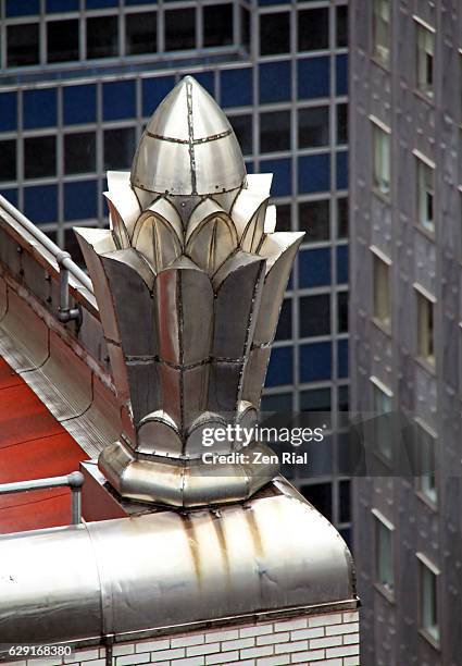 Chrysler Building And Metal Building Ornament On A Rainy Day