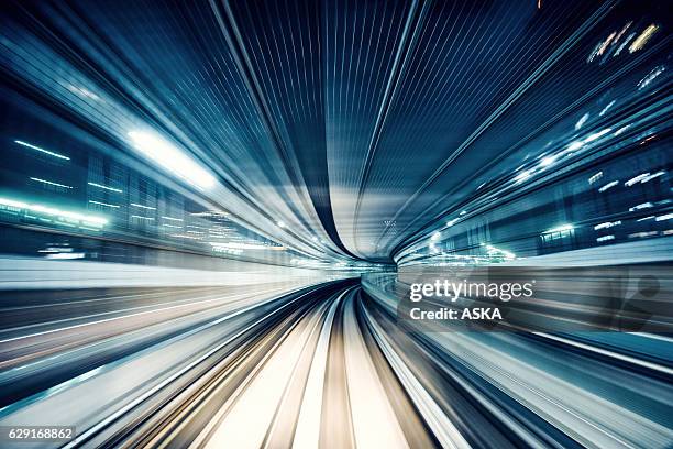 verschwommene bewegung in der u-bahn in tokio - lightrail stock-fotos und bilder