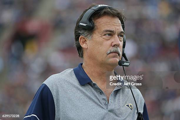Head coach Jeff Fisher of the Los Angeles Rams looks on against the Atlanta Falcons in the first half at Los Angeles Memorial Coliseum on December...
