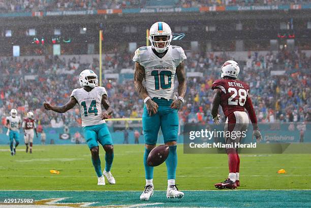 Miami Dolphins wide receiver Kenny Stills reacts after catching a pass against Arizona Cardinals cornerback Justin Bethel in the fourth quarter at...