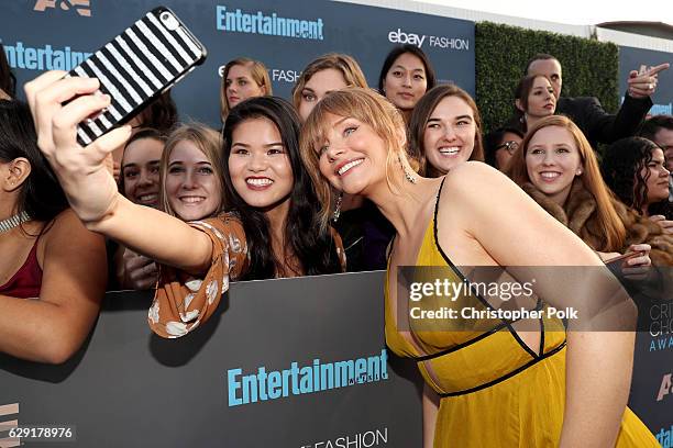 Actress Bryce Dallas Howard takes a selfie with fans during The 22nd Annual Critics' Choice Awards at Barker Hangar on December 11, 2016 in Santa...