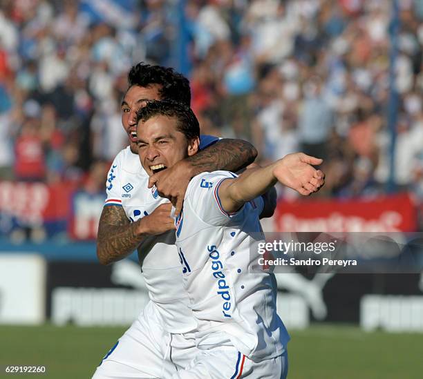 Sebastian Fernandez of Nacional celebrates after scoring the first goal of his team during a match between Nacional and Boston River as part of...