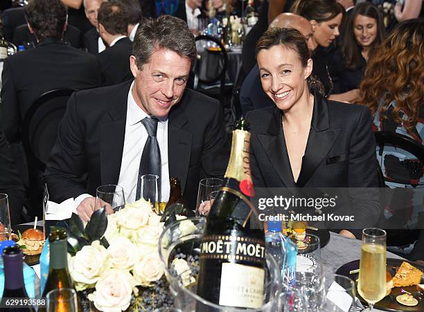 Actor Hugh Grant and Anna Elisabet Eberstein attend The 22nd Annual Critics' Choice Awards at Barker Hangar on December 11, 2016 in Santa Monica,...