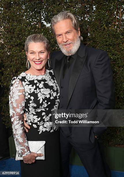Susan Geston and actor Jeff Bridges attend the 22nd annual Critics' Choice Awards with Porsche and the 2017 Panamera 4 E-Hybrid Executive at Barker...