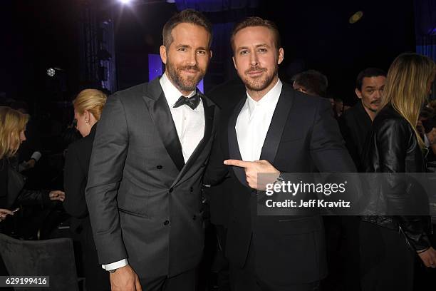 Actors Ryan Reynolds attend Ryan Gosling attend The 22nd Annual Critics' Choice Awards at Barker Hangar on December 11, 2016 in Santa Monica,...
