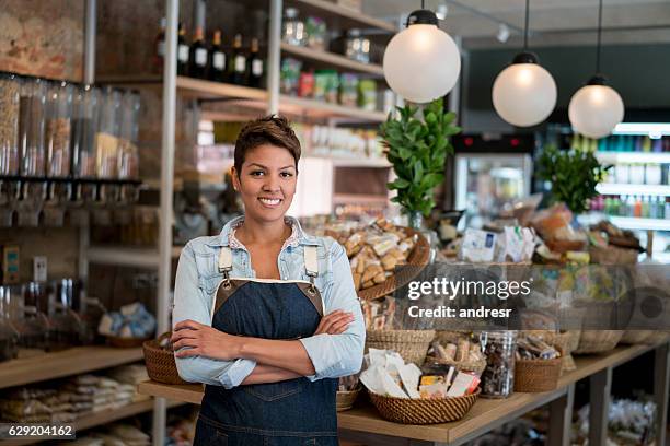 female store business owner - female supermarket stock pictures, royalty-free photos & images