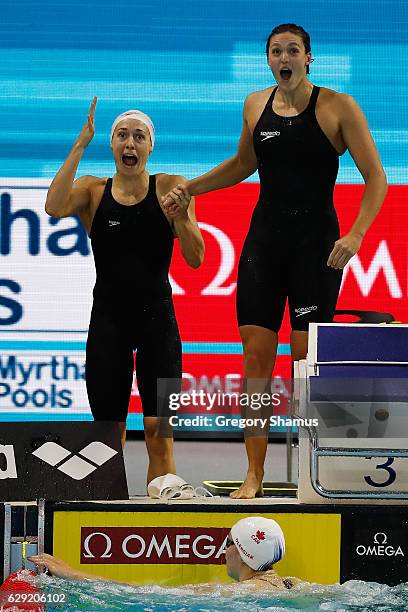 Sandrine Mainville and Michelle Williams of Team Canada celebrate their victory in the 4x50m Freestyle Relay on day six of the 13th FINA World...