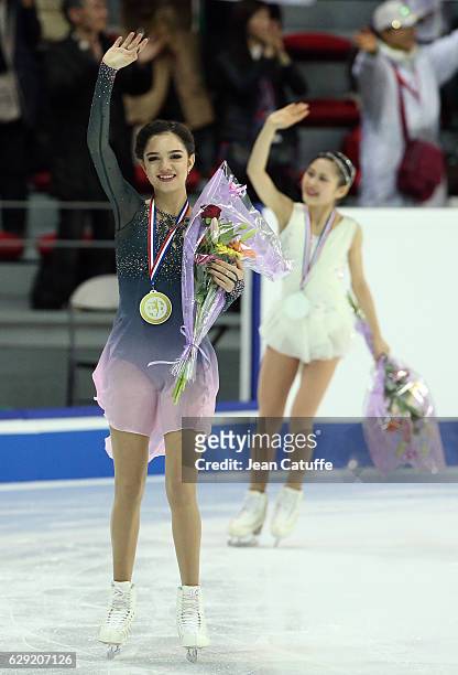 Gold medalist Evgenia Medvedeva of Russia, silver medalist Satoko Miyahara of Japan celebrate during Senior Ladies medal ceremony on day three of the...
