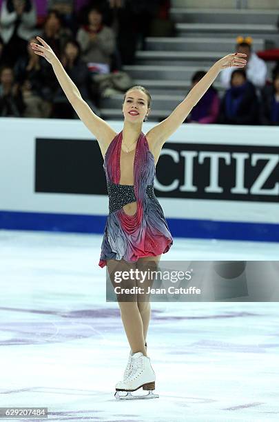 Bronze medalist Anna Pogorilaya of Russia celebrates during Senior Ladies medal ceremony on day three of the ISU Grand Prix of Figure Skating 2016 at...