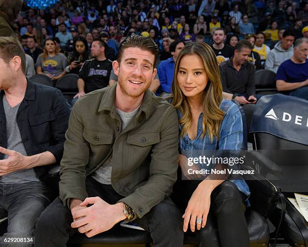 Bryan Greenberg and Jamie Chung attend a basketball game between the New York Knicks and the Los Angeles Lakers at Staples Center on December 11,...