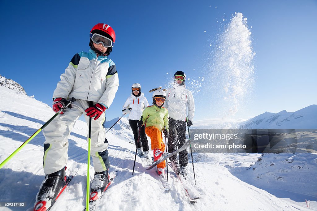 Skiing family in mountains