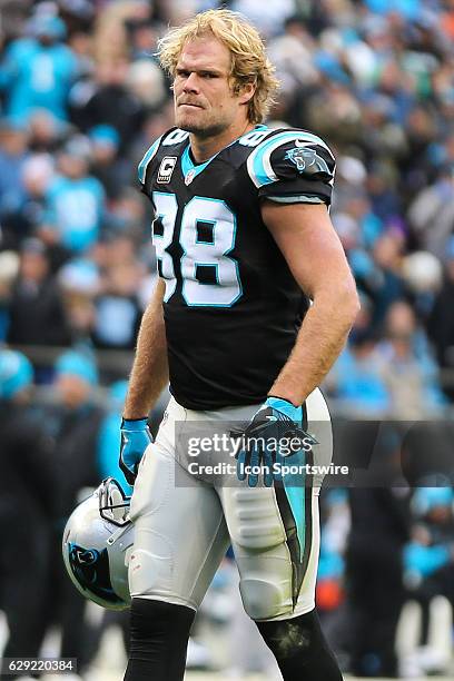 Carolina Panthers tight end Greg Olsen takes off his helmet during the game between the Carolina Panthers and the San Diego Chargers on December 11,...