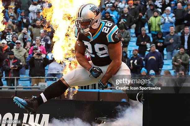 Carolina Panthers running back Jonathan Stewart leaps onto the field during the game between the Carolina Panthers and the San Diego Chargers on...