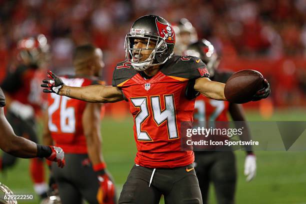 Tampa Bay Buccaneers cornerback Brent Grimes celebrates after intercepting a pass in the 4th quarter of the NFL game between the New Orleans Saints...