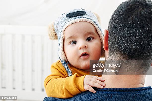 father burp baby boy after feeding breast - man burping stock pictures, royalty-free photos & images
