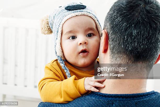 father burp baby boy after feeding breast - man burping stock pictures, royalty-free photos & images