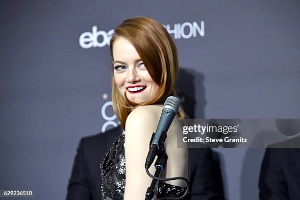 Actress Emma Stone poses in the press room after winning the award for Best Picture for the film 'La La Land' during The 22nd Annual Critics' Choice...