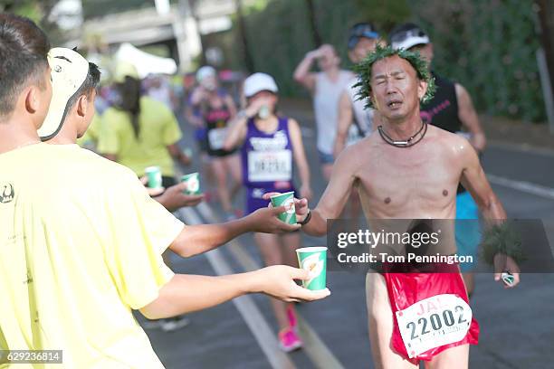Participant in costume runs during the Honolulu Marathon 2016 on December 11, 2016 in Honolulu, Hawaii.