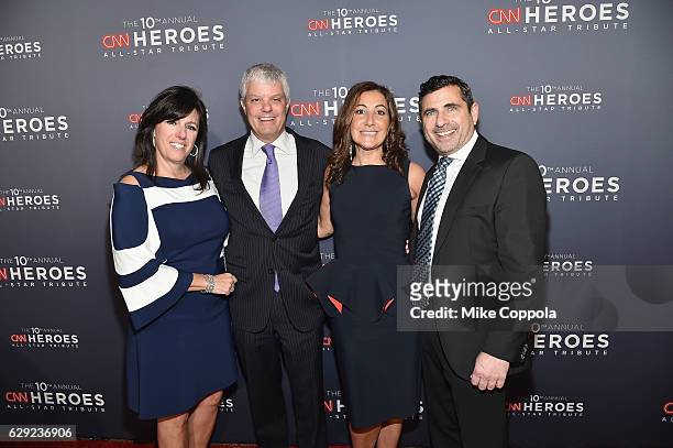 Niki Levy, President of Turner David Levy, President of Turner Ad Sales Donna Speciale, and a guest attend CNN Heroes Gala 2016 at the American...