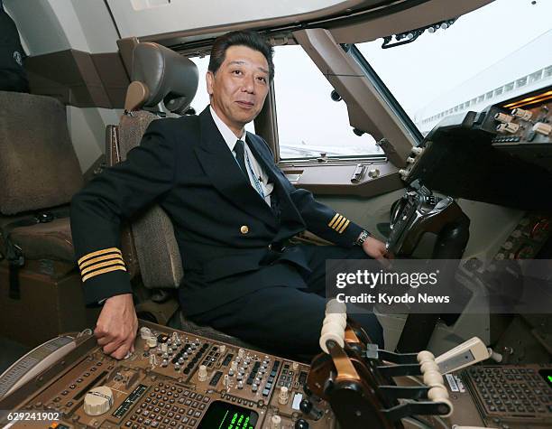 Japan - All Nippon Airways Co. Pilot Michihiko Tanaka sits in the cockpit of a Boeing 747 at Tokyo's Haneda airport on Dec. 18, 2013. The Japanese...