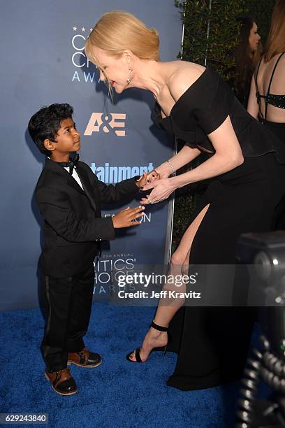 Actor Sunny Pawar and actress Nicole Kidman attend The 22nd Annual Critics' Choice Awards at Barker Hangar on December 11, 2016 in Santa Monica,...