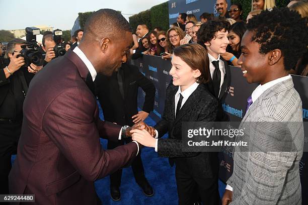 Actors Sterling K. Brown, Noah Schnapp and Caleb McLaughlin attend The 22nd Annual Critics' Choice Awards at Barker Hangar on December 11, 2016 in...