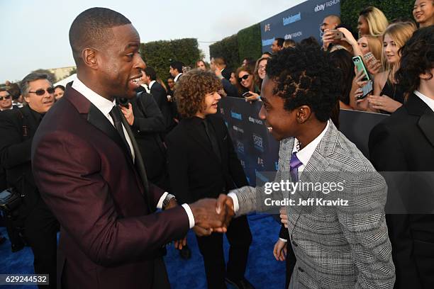 Actors Sterling K. Brown, Noah Schnapp and Caleb McLaughlin attend The 22nd Annual Critics' Choice Awards at Barker Hangar on December 11, 2016 in...