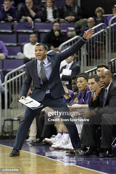 Washington assistant coach Will Conroy directs his team on defense against Nevada. Nevada won 87-85 on a last second basket on December 11 at Alaska...