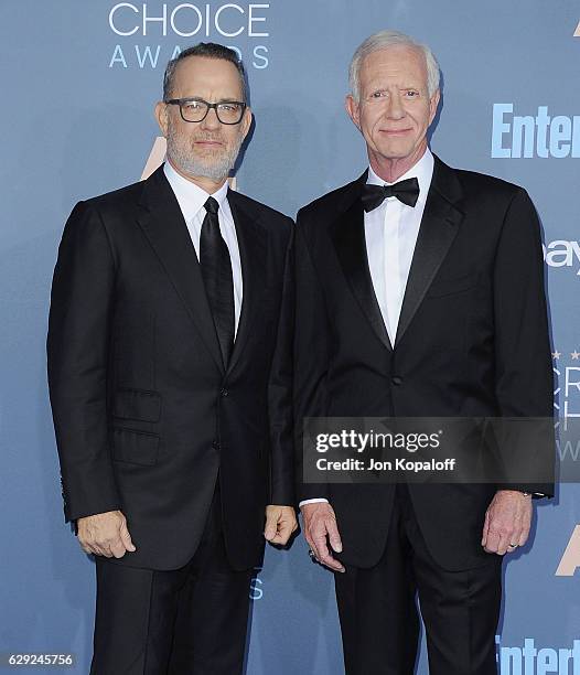 Actor Tom Hanks and Chesley Sullenberger arrive at The 22nd Annual Critics' Choice Awards at Barker Hangar on December 11, 2016 in Santa Monica,...