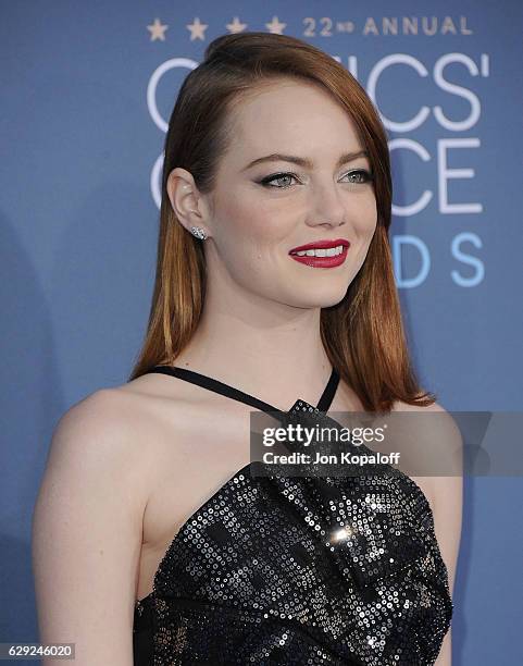 Actress Emma Stone arrives at The 22nd Annual Critics' Choice Awards at Barker Hangar on December 11, 2016 in Santa Monica, California.