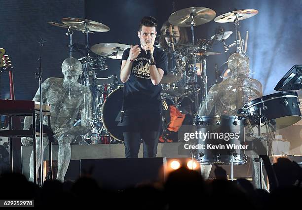 Dan Smith and drummer Chris Wood of the band Bastille perform onstage at 106.7 KROQ Almost Acoustic Christmas 2016 - Night 2 at The Forum on December...