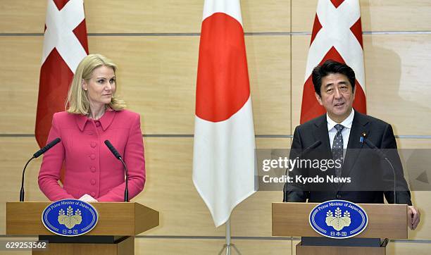 Japan - Japanese Prime Minister Shinzo Abe and his Danish counterpart Helle Thorning-Schmidt hold a joint press conference after their talks at Abe's...