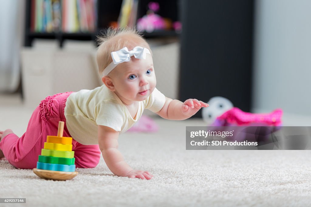 Beautiful crawling baby girl