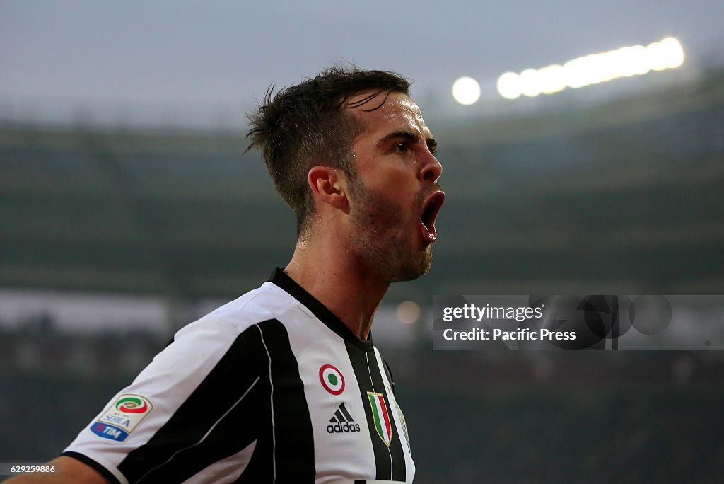 Miralem Pjanic of Juventus celebrates after scoring during...