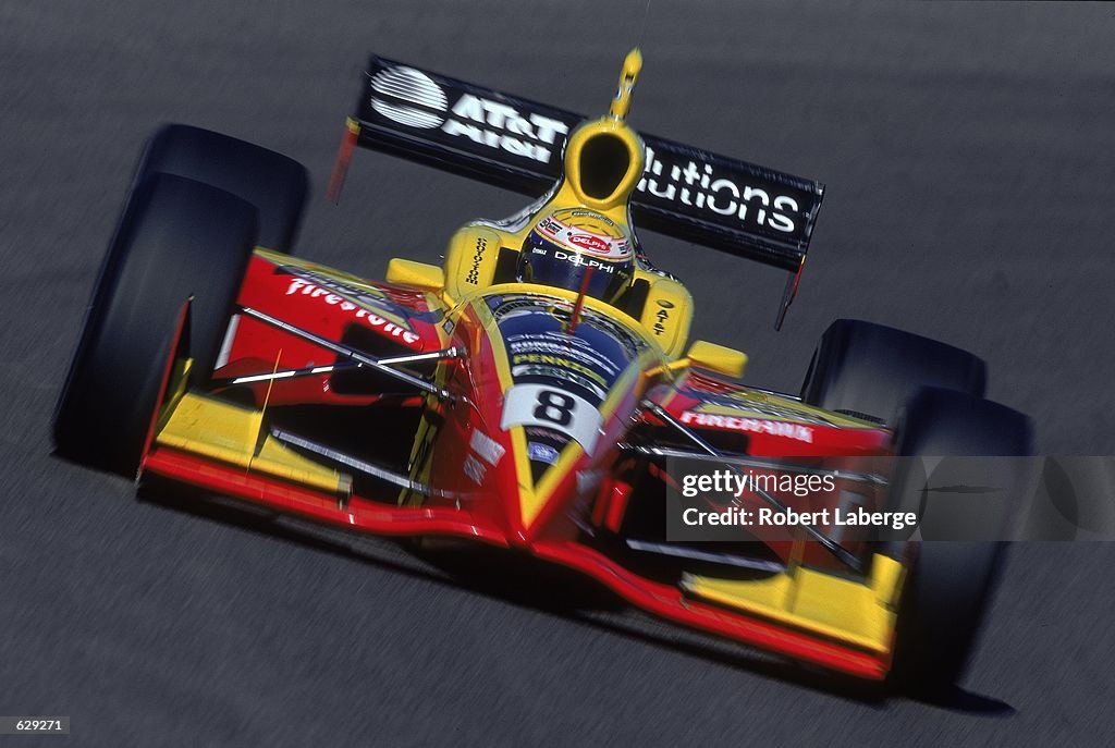 Scott R. Sharp Scott Sharp speeds out of a turn during the Pennzoil Copper World ...