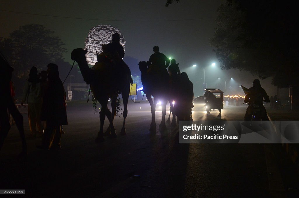 Pakistani devotee Muslims attend the celebration on Mawlid...