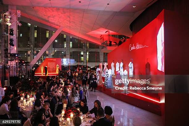 Guests dine in front of the exhibit at "An Evening Honoring Carolina Herrera" Lincoln Center Corporate Fund Gala at Alice Tully Hall at Lincoln...