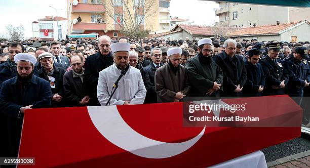 Deputy Prime Minister Numan Kurtulmus attends the funeral of police officer Erdem Ozcelik who was killed in bomb attacks outside the Vodafone Stadium...