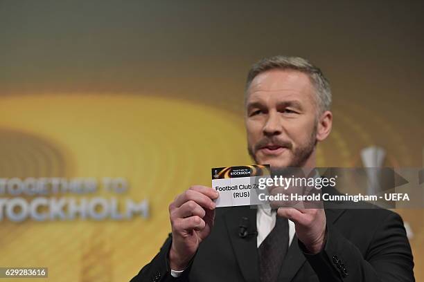 Europa League Ambassador Patrik Andersson draws out the name of FC Zenit during the UEFA Europa League 2016/17 Round of 32 Draw at the UEFA...
