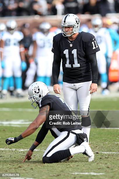 Sebastian Janikowski of the Oakland Raiders in action during the game against the Carolina Panthers at the Oakland-Alameda County Coliseum on...