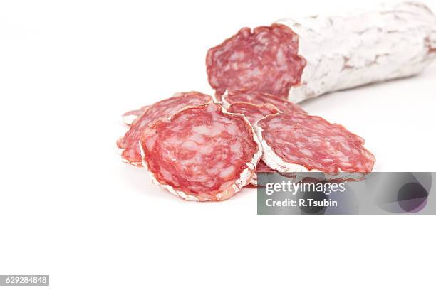 sliced salami isolated - pepperoni slice stock pictures, royalty-free photos & images