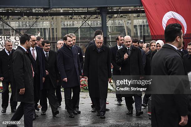 Turkish President Recep Tayyip Erdogan visits the blast site outside the Besiktas FC's Vodafone Arena Stadium on December 12, 2016 in Istanbul,...