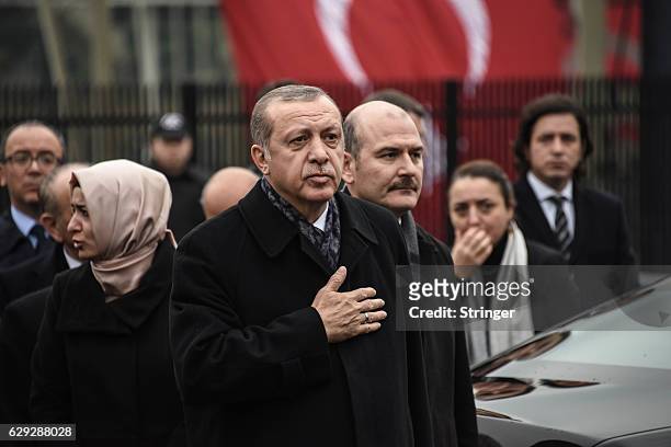 Turkish President Recep Tayyip Erdogan visits the blast site outside the Besiktas FC's Vodafone Arena Stadium on December 12, 2016 in Istanbul,...