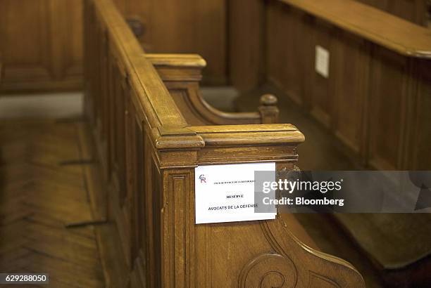 Reserved' sign sits on the courtroom seats for the legal team representing Christine Lagarde, managing director of the International Monetary Fund ,...