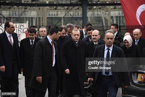 Turkish President Recep Tayyip Erdogan visits the blast site outside the Besiktas FC's Vodafone Arena Stadium on December 12, 2016 in Istanbul,...