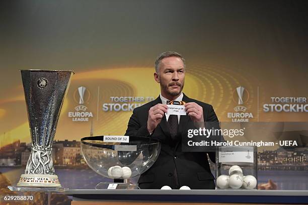 Europa League Ambassador Patrik Andersson draws out the name of Fenerbache SK during the UEFA Europa League 2016/17 Round of 32 Draw at the UEFA...