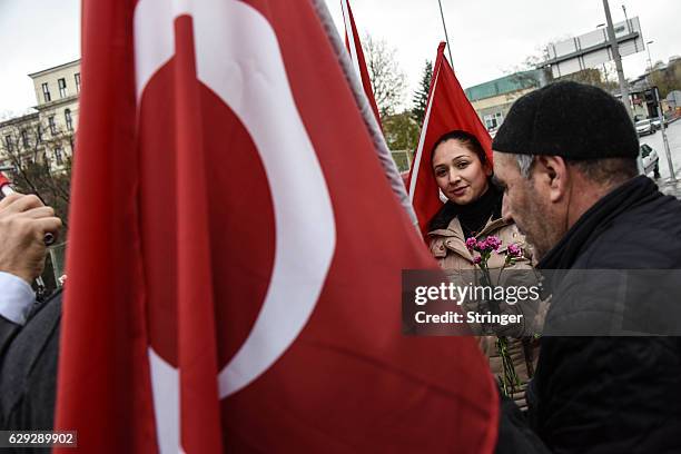 People visit the the scene of Saturday's blasts on December 12, 2016 in Istanbul, Turkey. At least 44 people were killed and 160 other wounded in...