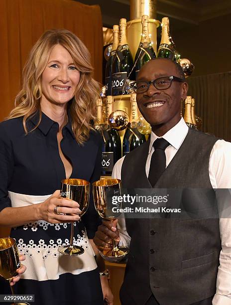 Actors Laura Dern and Don Cheadle attend Moet & Chandon toast to the 74th Annual Golden Globe Awards nominations on December 12, 2016 in Los Angeles,...