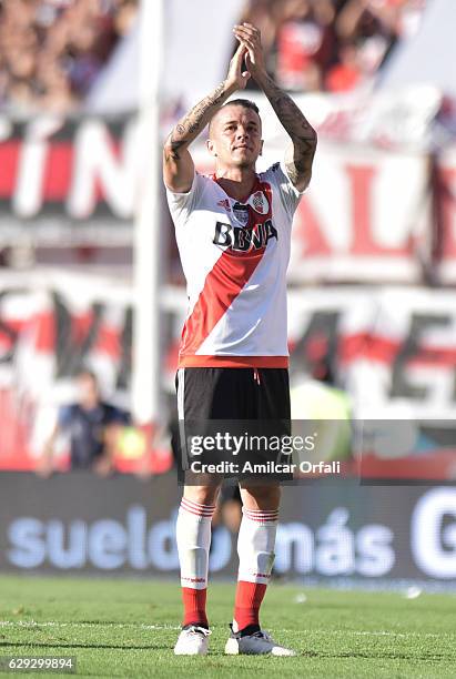 Andres D'Alessandro of River Plate greets the fans after being substituted during a match between River Plate and Boca Juniors as part of Torneo...