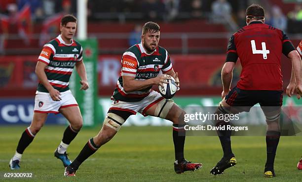 Ed Slater of Leicester runs with the ball during the European Champions Cup match between Munster and Leicester Tigers at Thomond Park on December...